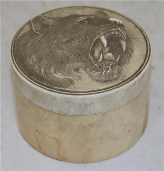 A Japanese ivory circular box and cover, early 20th century, diameter 9.5cm, re-glued